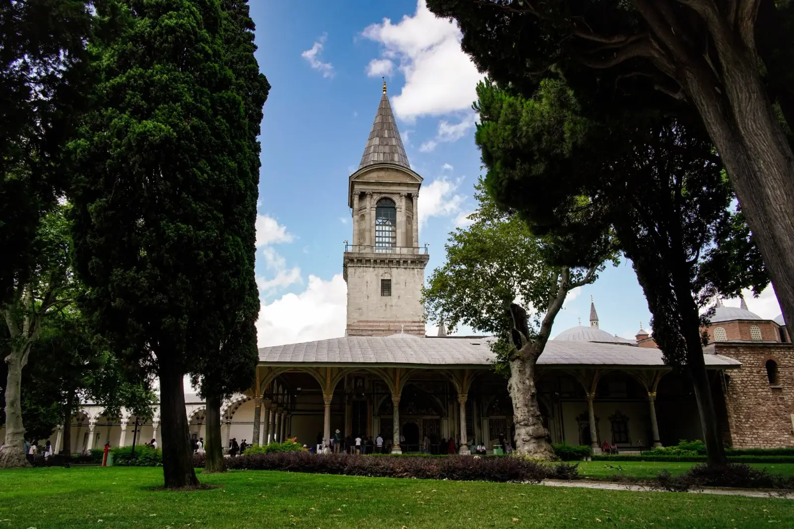 Tower of Justice rising above the cypress trees in the Second Courtyard of Topkapı Palace